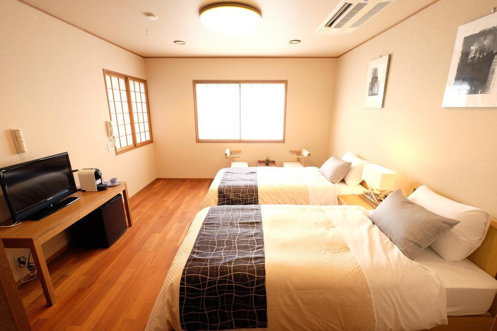 Miyagawacho Yoshii Hotel Quioto Quarto foto